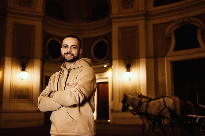 1.5 Hour Cinematic Style Portrait Photoshoot and Tour in Vienna - Hofburg Palace, palace gates, and horse carriages