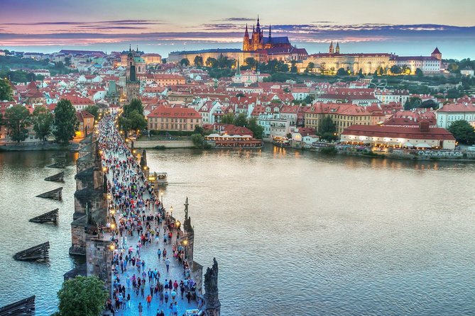 Prague private day tour from Vienna ( local guide ) - Crossing Charles Bridge over the Vltava
