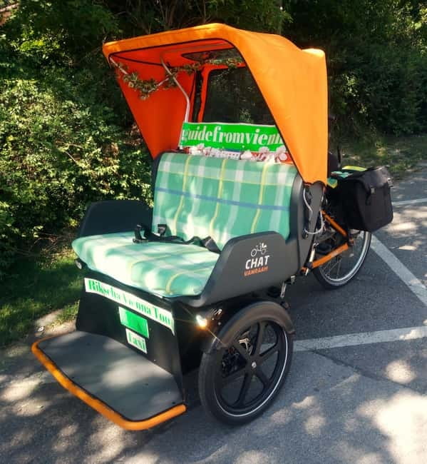 RAXI (Electric Rickshaw) Vienna Tours with two options - Comfort in cool weather, and the limits of an open vehicle