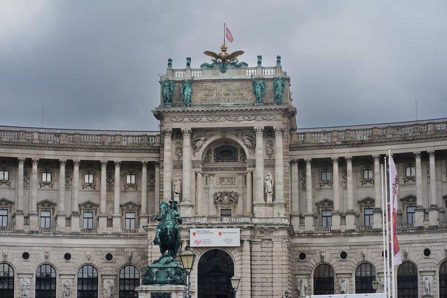 Vienna: Guided Walking Tour of City Highlights & Hidden Gems - Michaelerplatz and the Hofburg entrance