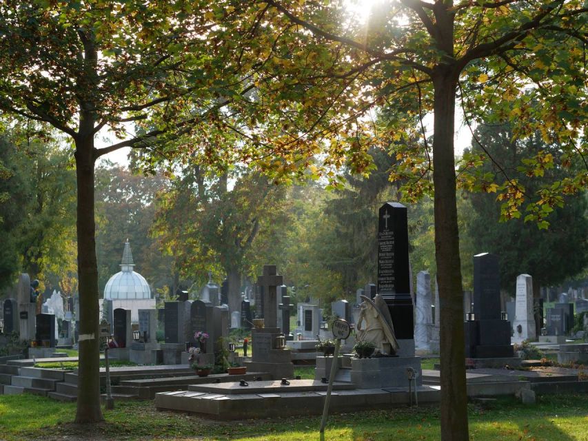 Vienna: Guided Walking Tour of the Central Cemetery - Ornate grave art and final inscriptions