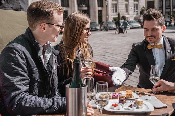 Vienna Horse-Drawn Carriage Ride with Sparkling Wine and Food - Starting beneath the Hofburg
