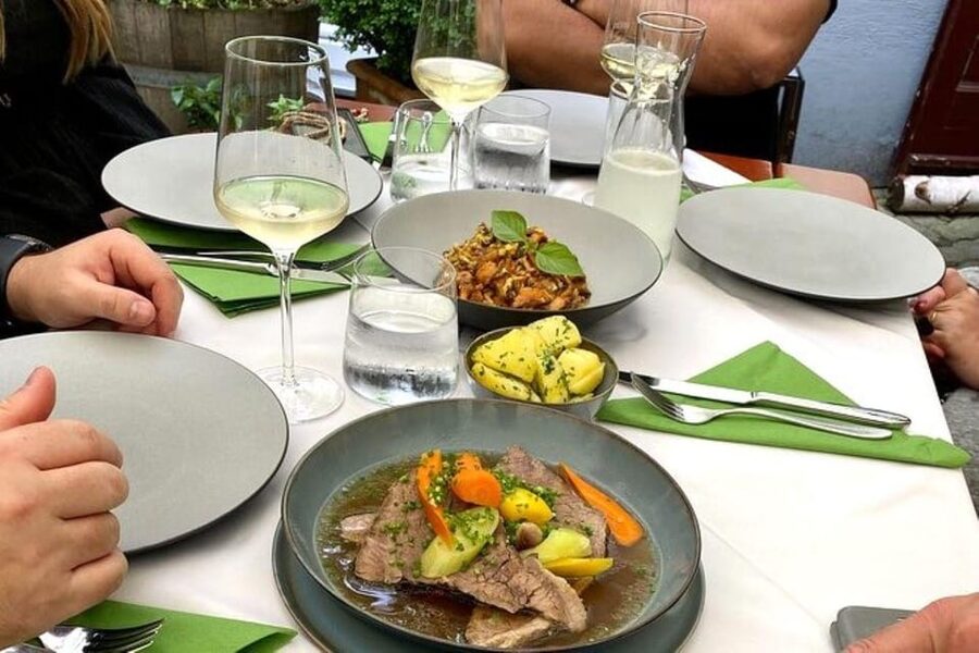 Vienna Nightlife: Food, Wine, Cocktails and Rooftop Bar Tour - A classic Viennese dinner, with room for vegetarian diners