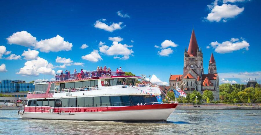 Vienna: Sightseeing Boat Tour with Lunch - The boat and seating experience