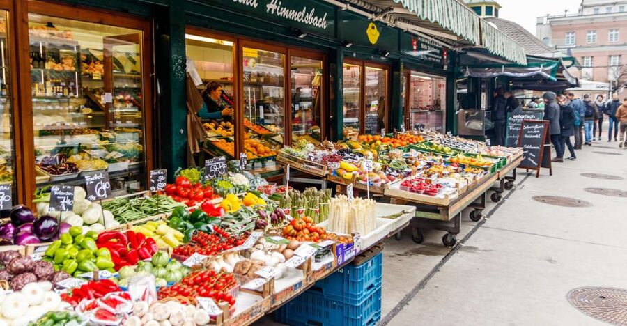 Vienna: Typical Austrian Food Tour with Coffee House Visit - Walking to Naschmarkt for Austrian cheese