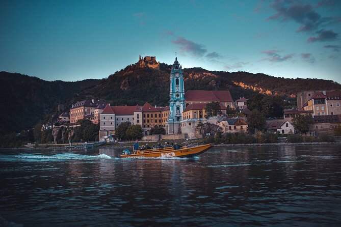 Wine tasting on traditional wooden boats in Wachau Valley - A Wooden Boat Gives the Wachau a Different Rhythm
